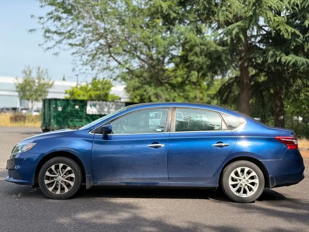 Used 2019 Blue Nissan SV image 2