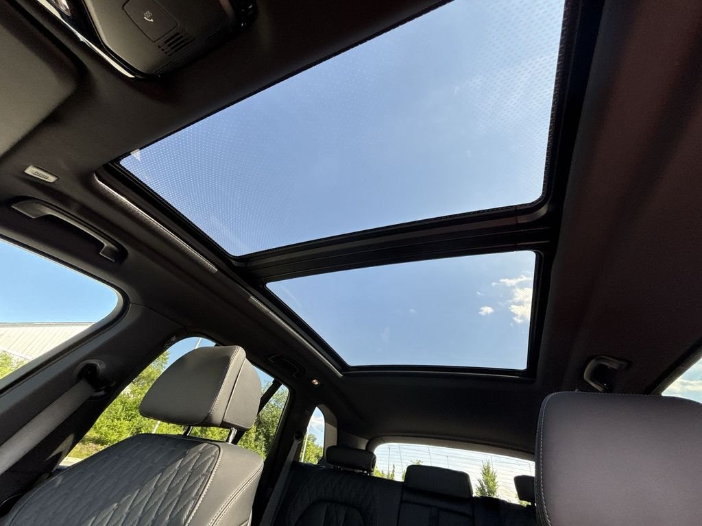 New 2026 Black Sapphire Metallic BMW xDrive50e image 16
