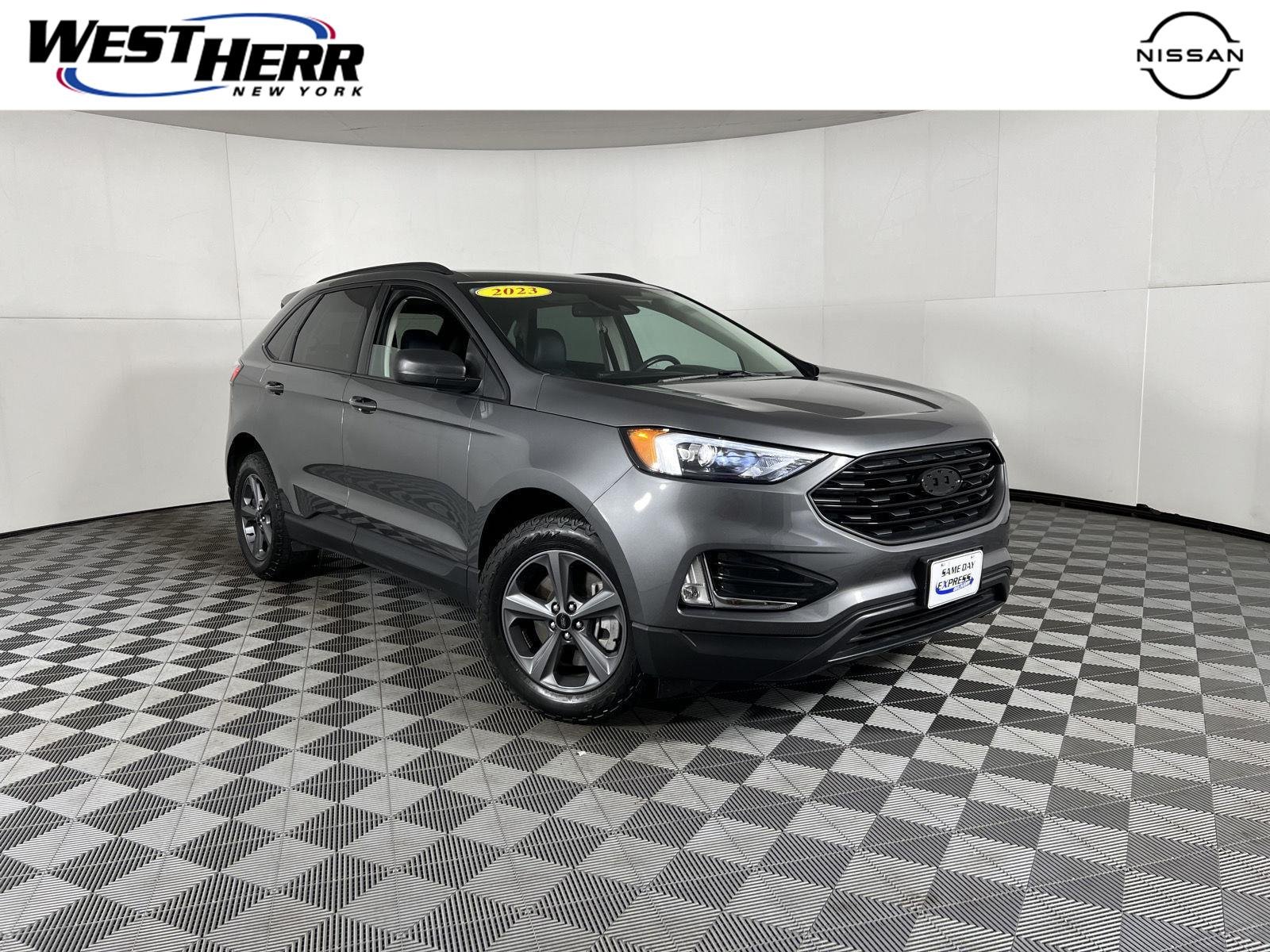 Used 2023 Carbonized Gray Ford SEL image 1