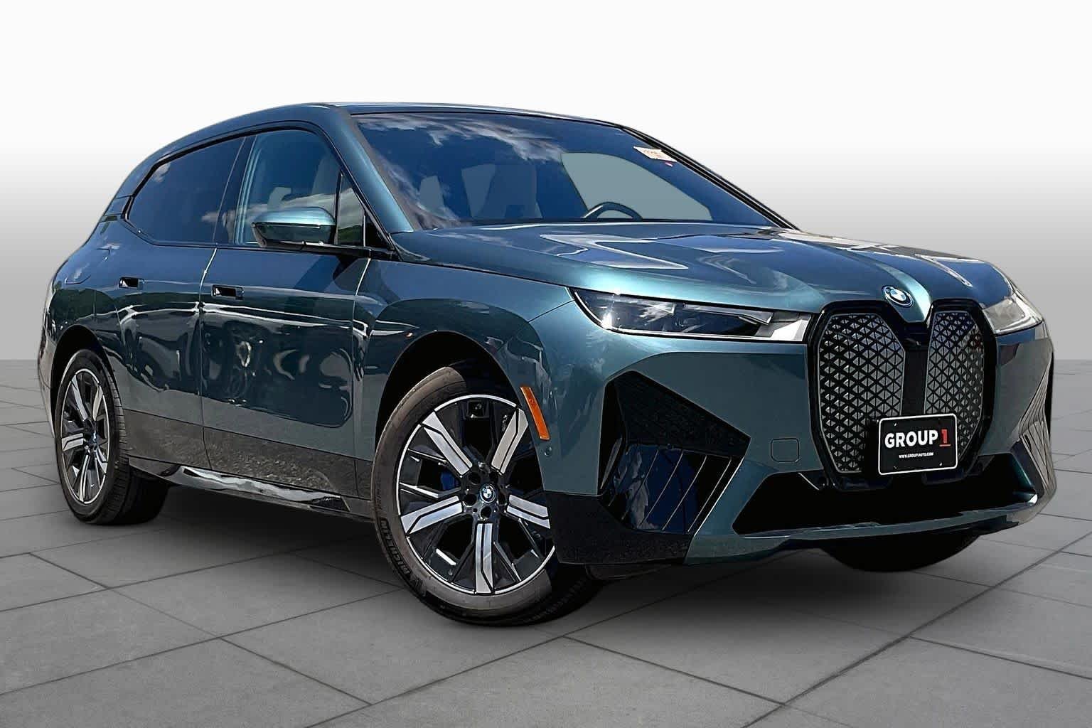 Used 2023 Blue Ridge Mountain Metallic BMW xDrive50 image 2