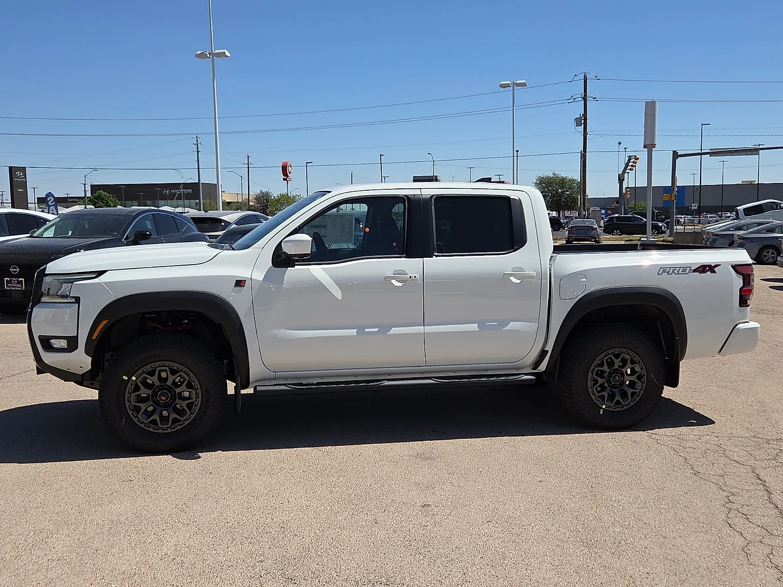 New 2026 QAK Glacier WH Nissan PRO-4X w/R Package 4x4 Crew Cab 5 ft. box 126 in. image 2