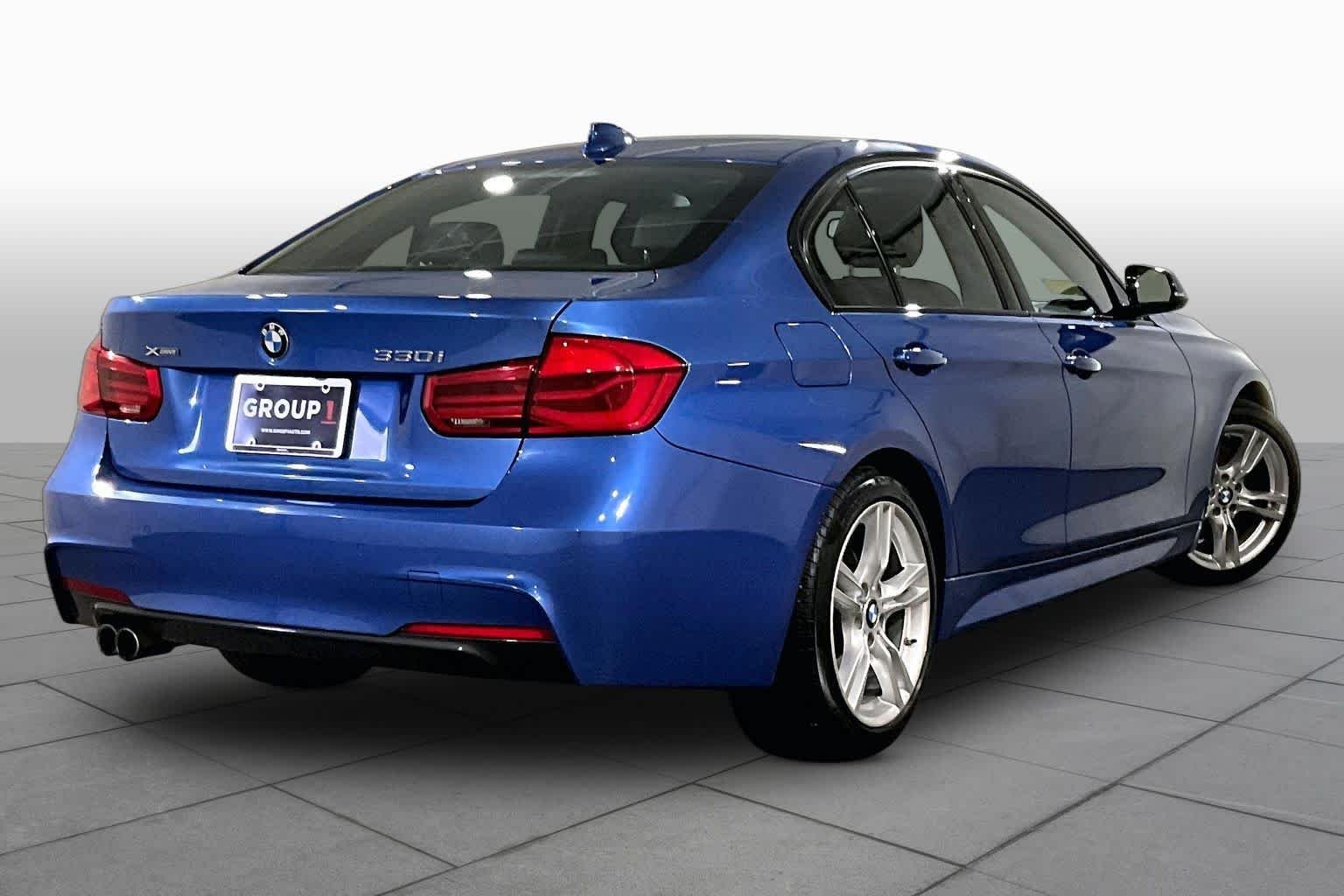 Used 2018 Estoril Blue Metallic BMW 330i xDrive image 12