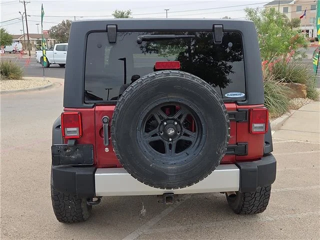Used 2011 Red Jeep Sahara 4x4 image 3