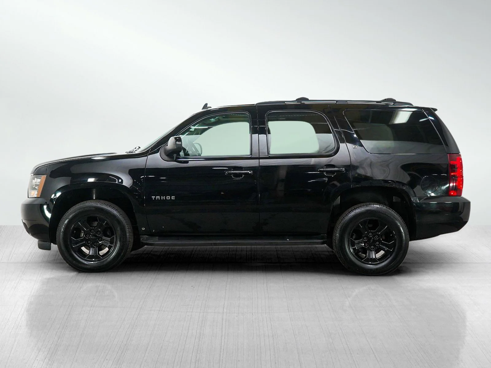 Used 2012 Chevrolet Tahoe LT with VIN 1GNSKBE03CR101211 for sale in Burnsville, Minnesota