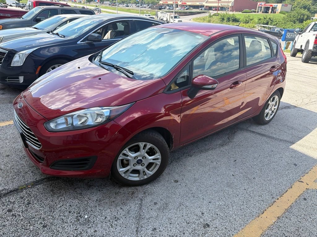 Used 2014 Ruby Red Metallic Ford SE image 1