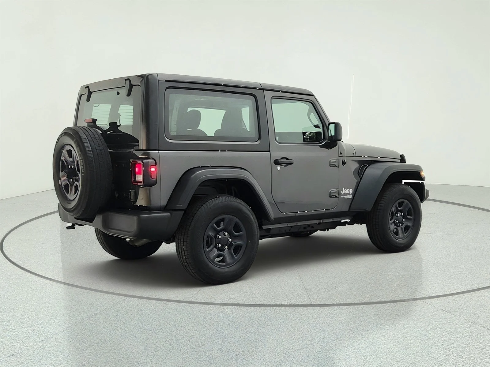 Used 2018 Granite Crystal Metallic Clearcoat Jeep Sport image 5