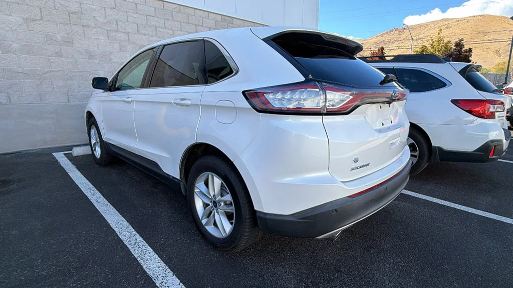 Used 2015 White Platinum Clearcoat Metallic Ford SEL image 3