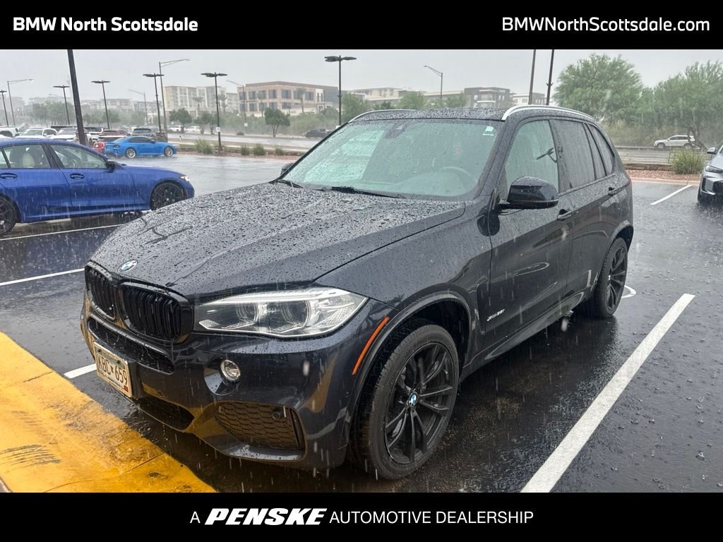 Used 2018 Carbon Black Metallic BMW xDrive35i image 1