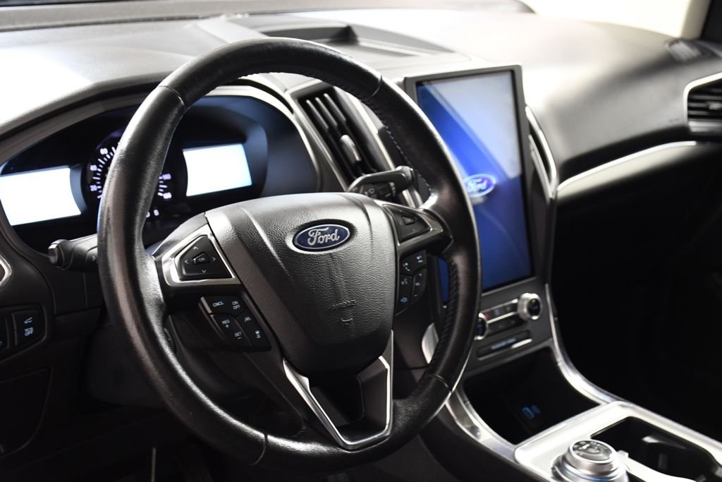 Used 2022 Agate Black Metallic Ford Titanium image 13