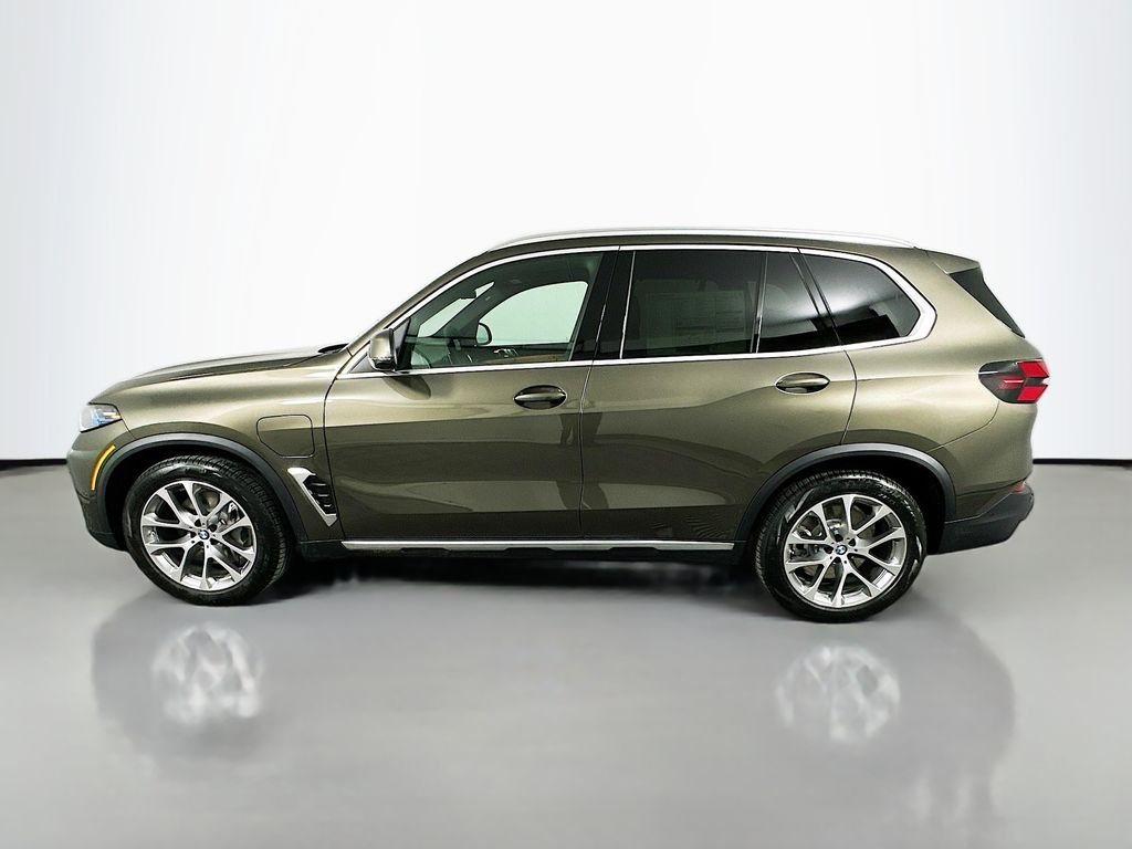 Used 2026 Manhattan Green Metallic BMW xDrive50e image 8