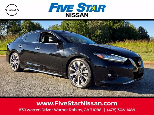 Used 2021 Black Nissan Platinum image 1