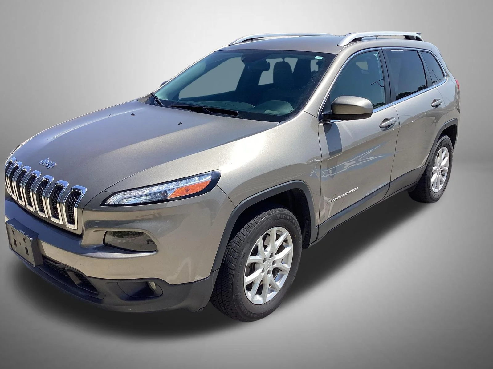 Used 2016 Beige Jeep Latitude image 1