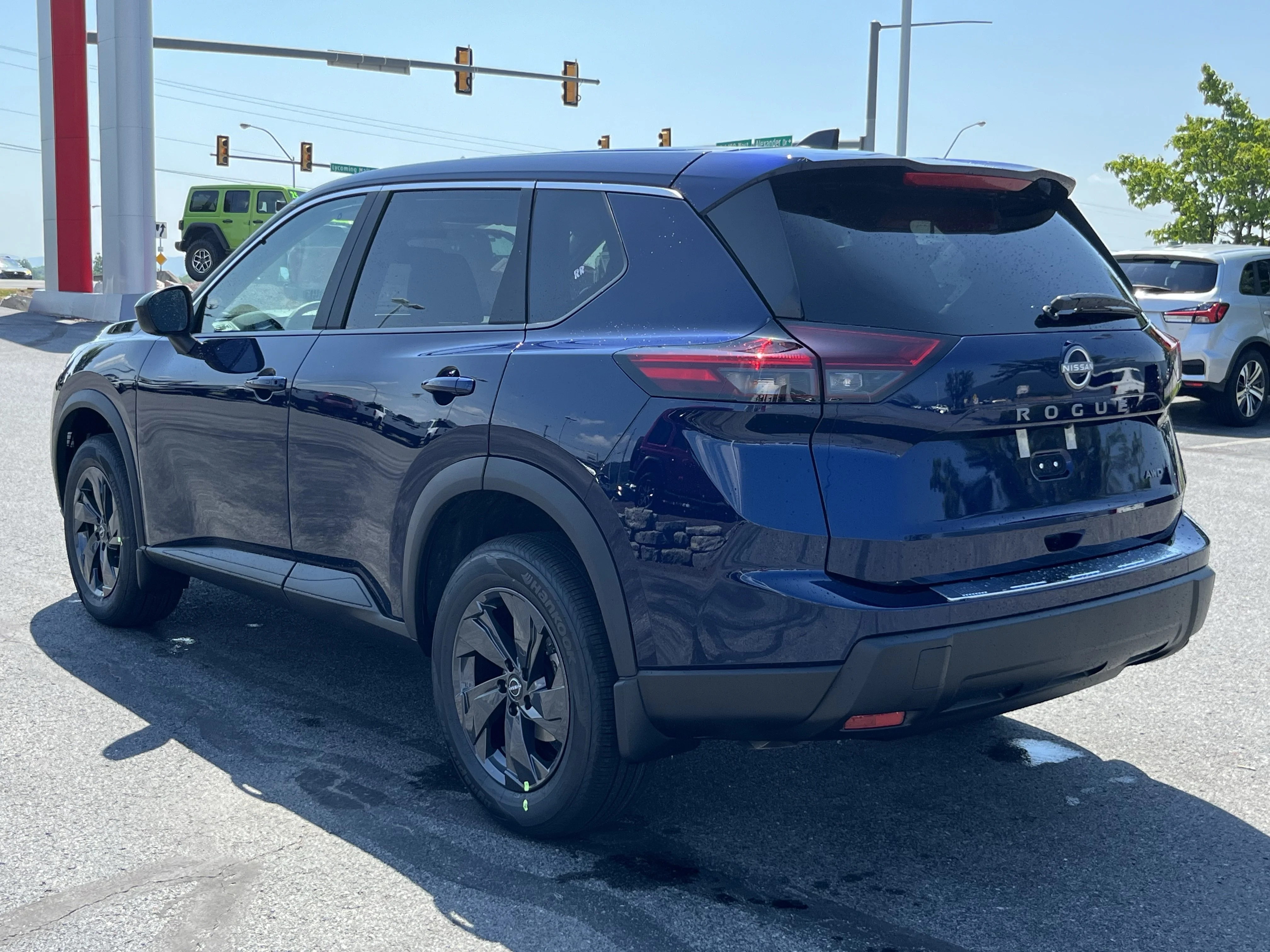 New 2026 Deep Ocean Blue Pearl Nissan SV image 9