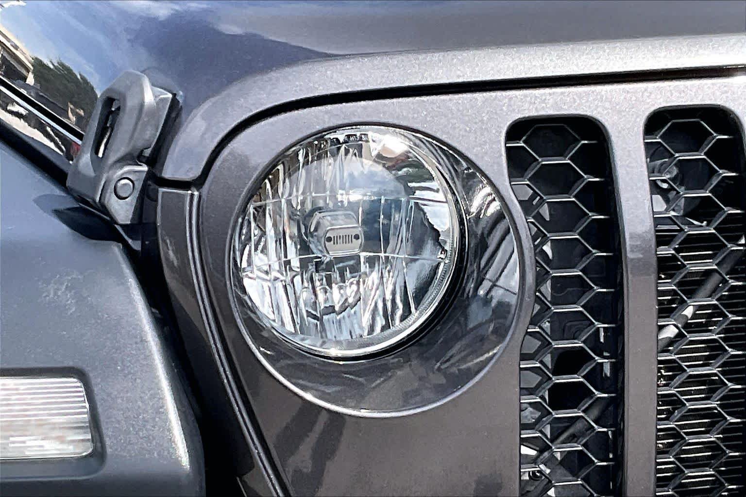 Used 2023 Granite Crystal Metallic Clearcoat Jeep Sport image 24