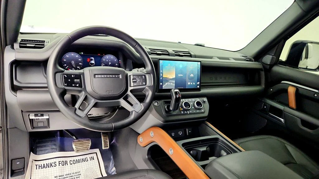 Used 2023 Santorini Black Metallic Land Rover 110 X AWD w/ Explorer Pack, Extended Black Ext. & Towing Pack image 13