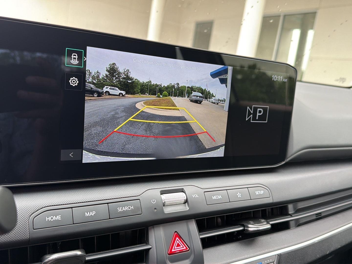Used 2025 Snow White Pearl Kia LXS image 24