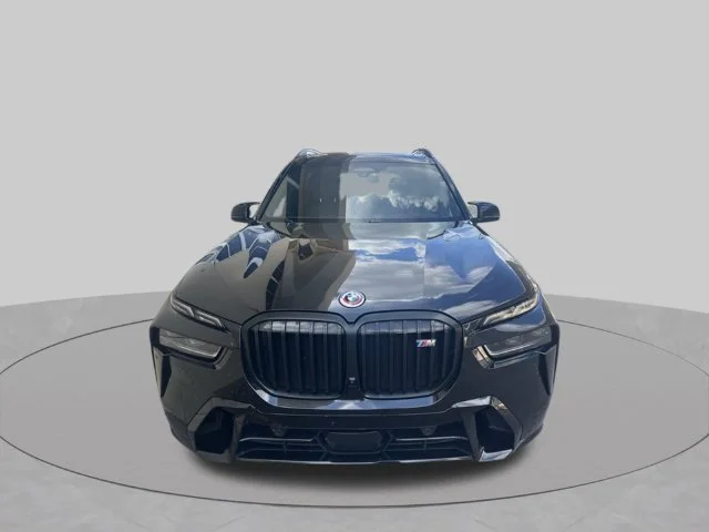 Used 2023 Black Sapphire Metallic BMW M60i image 2