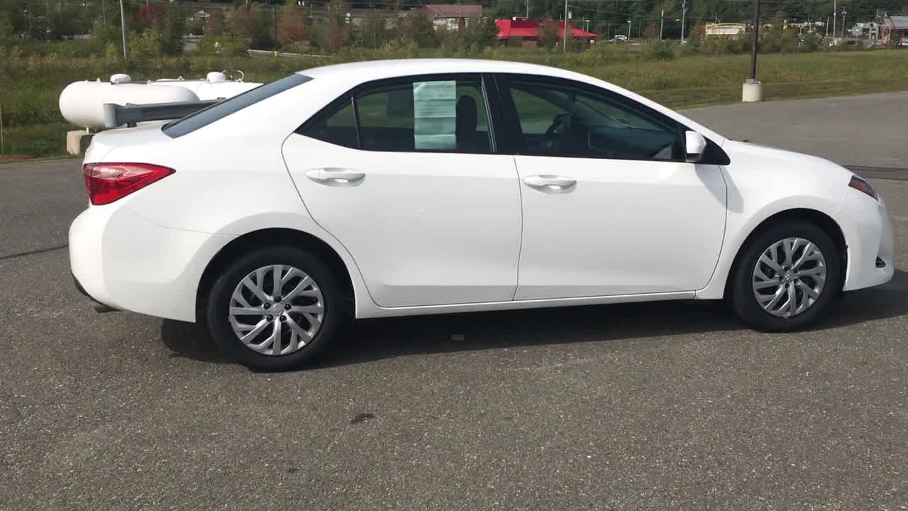 Used 2018 Super White Toyota LE image 9