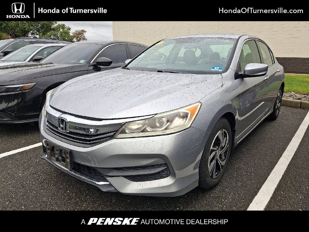 Certified Used 2016 Lunar Silver Metallic Honda LX image 1