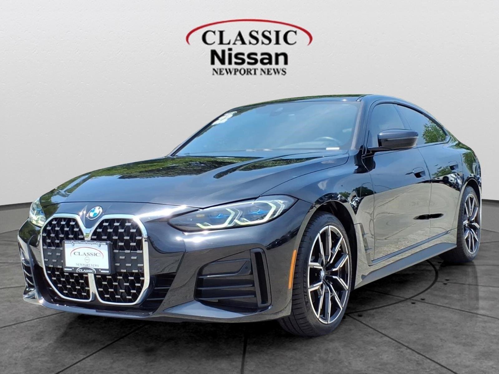 Used 2022 Black Sapphire Metallic BMW 430i image 1