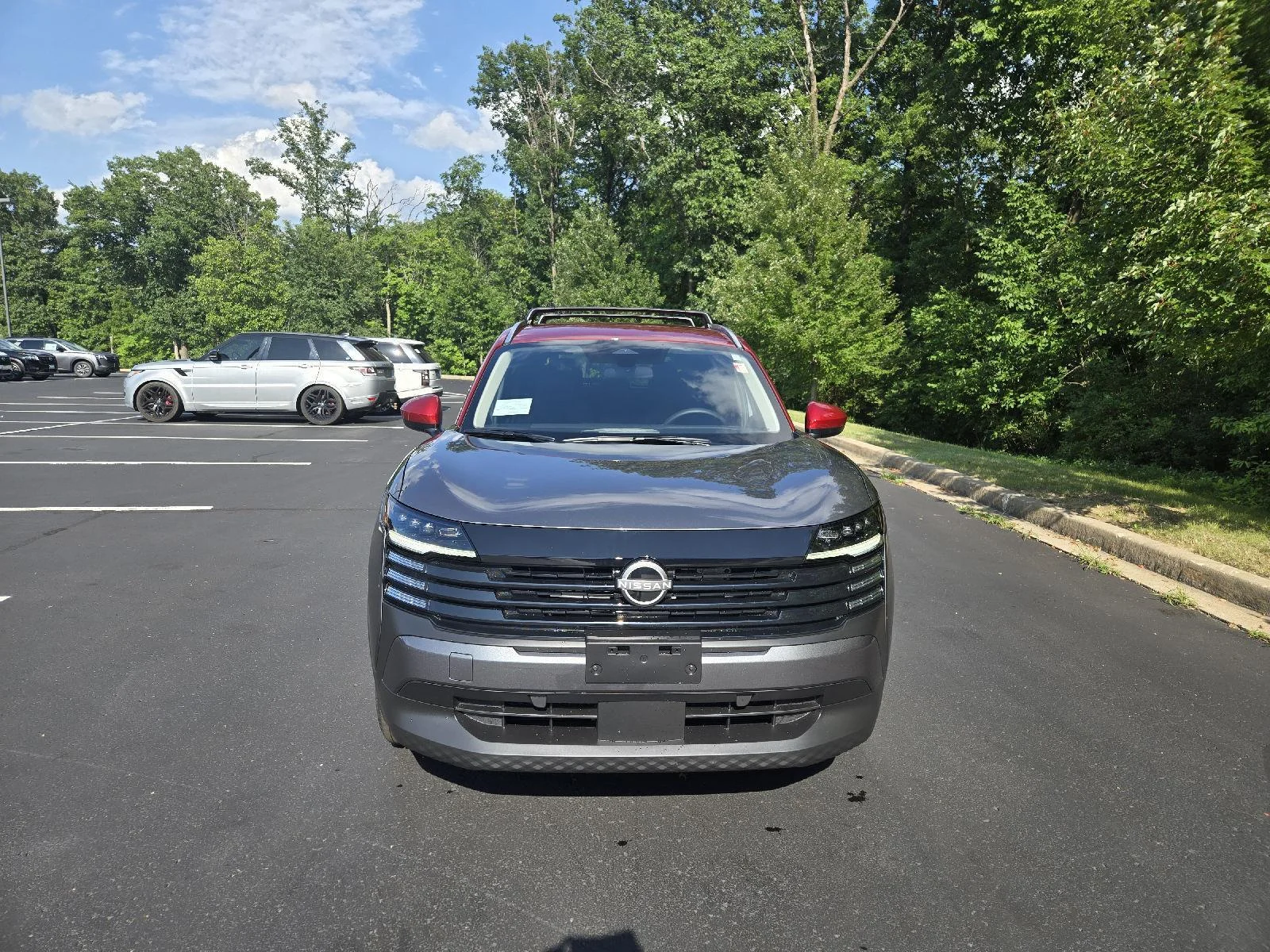 New 2026 Gun Metallic/Scarlet Ember Tintcoat Nissan SV image 7