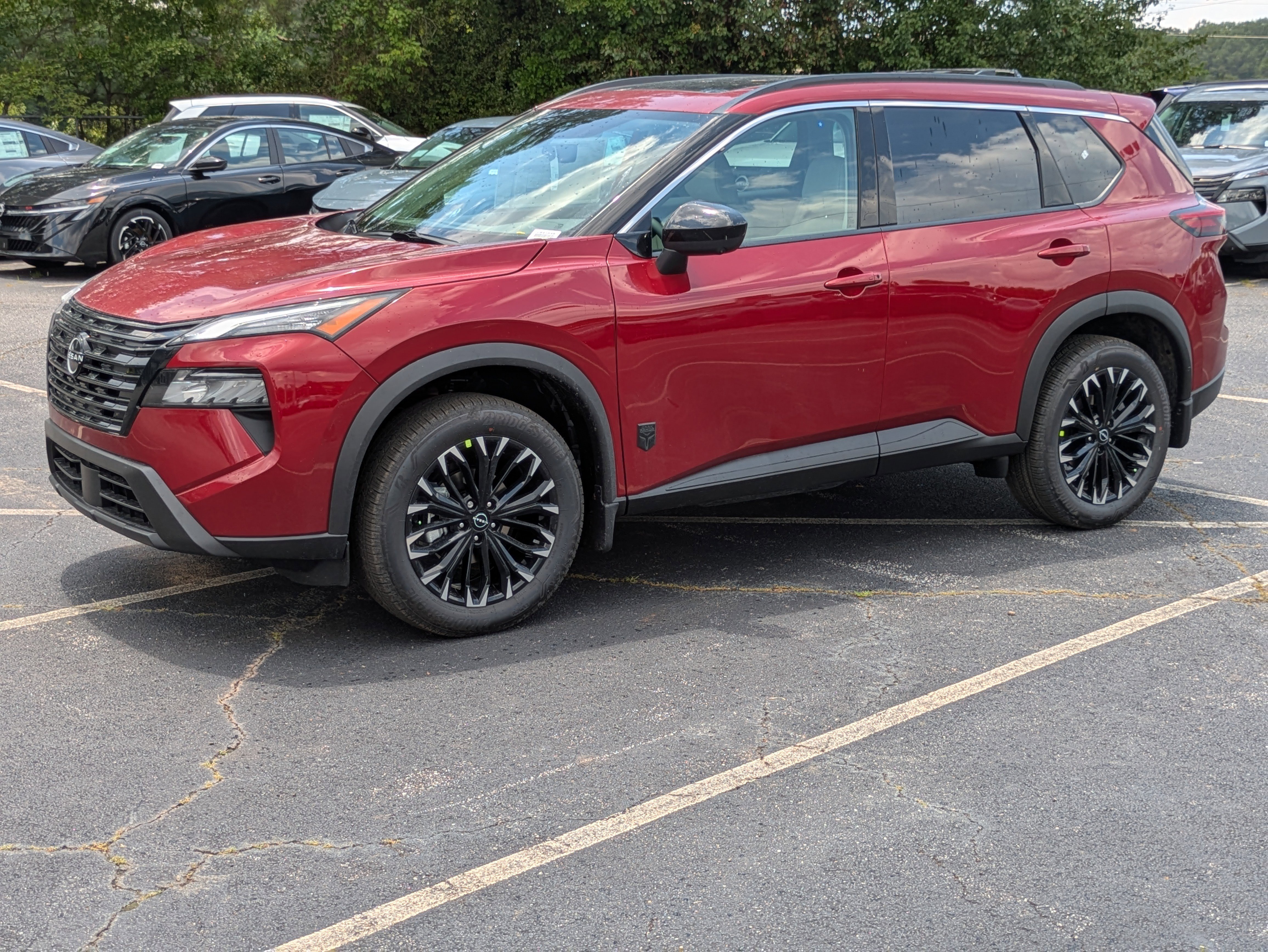 New 2026 Red Nissan Dark Armor image 4