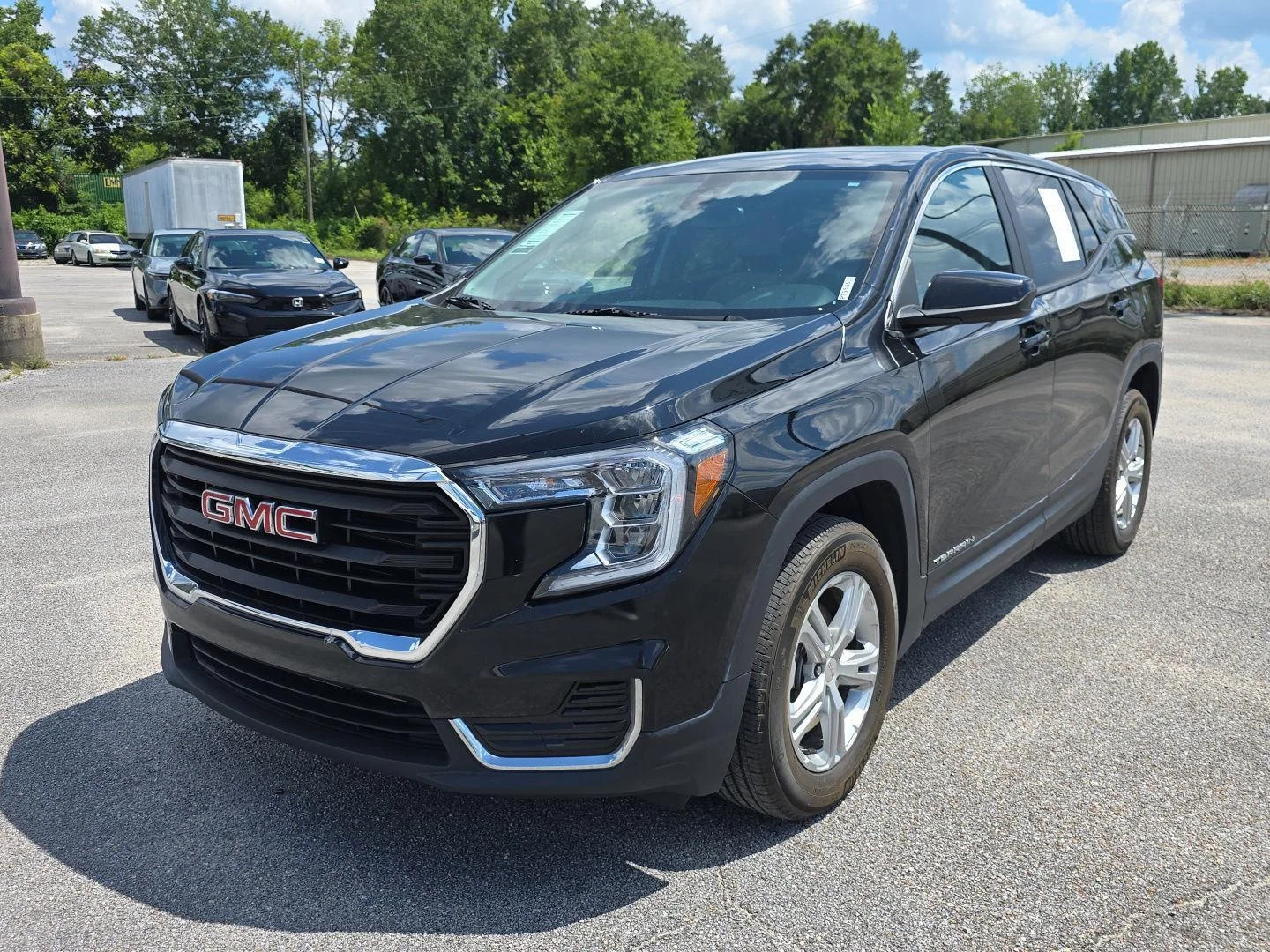 Used 2024 Ebony Twilight Metallic GMC SLE image 9