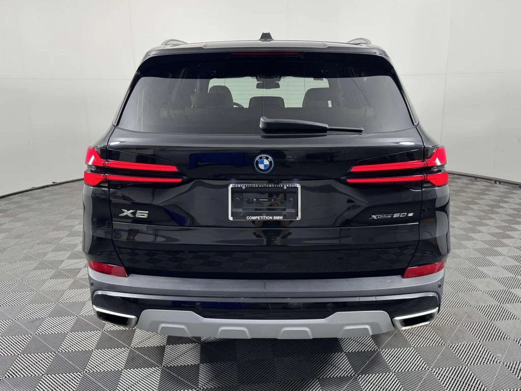 Certified Used 2024 Black BMW xDrive50e image 9