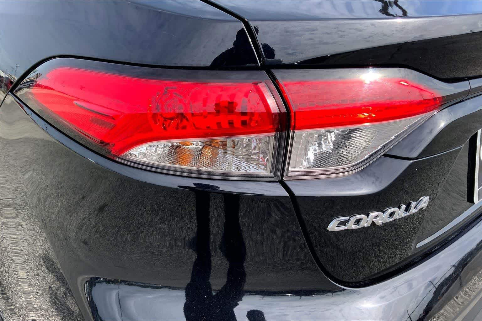 Used 2024 Midnight Black Metallic Toyota LE image 28