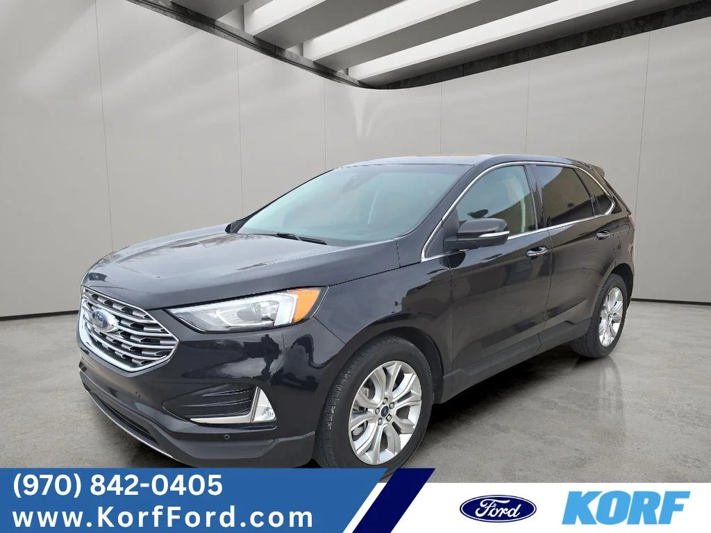 Used 2022 Black Ford Titanium image 1