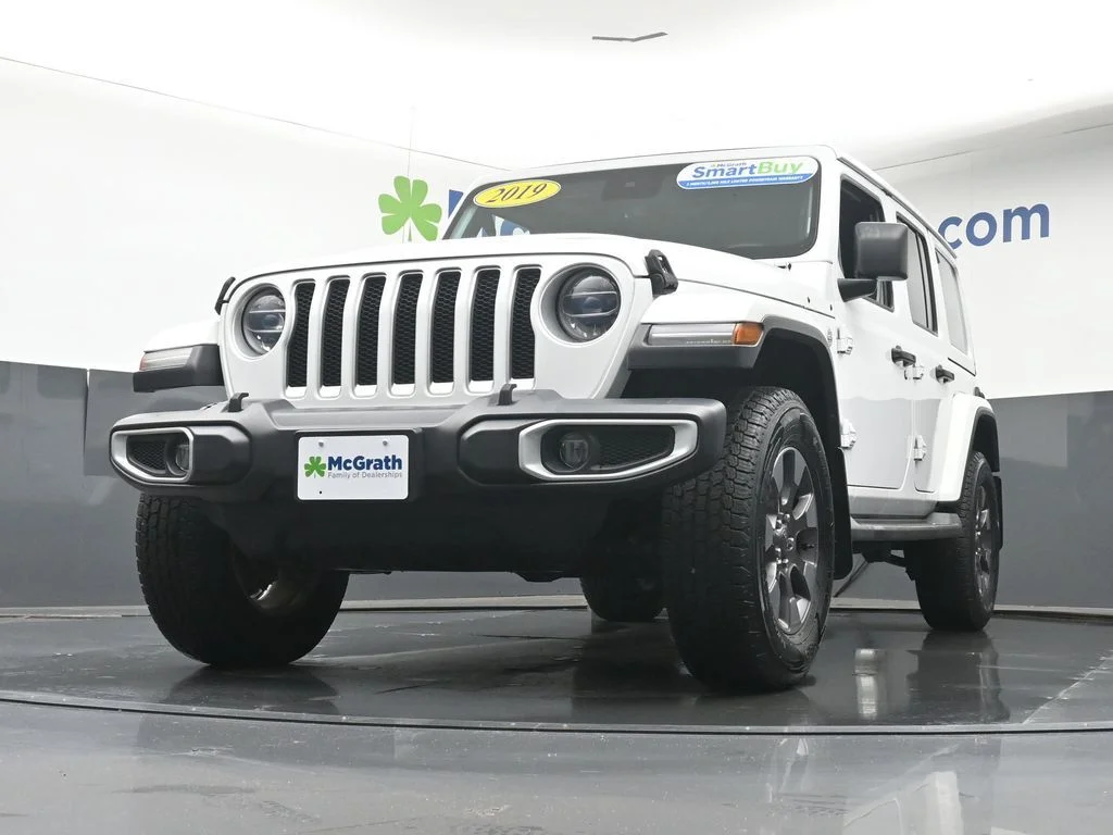 Used 2019 White Jeep Unlimited Sahara image 7