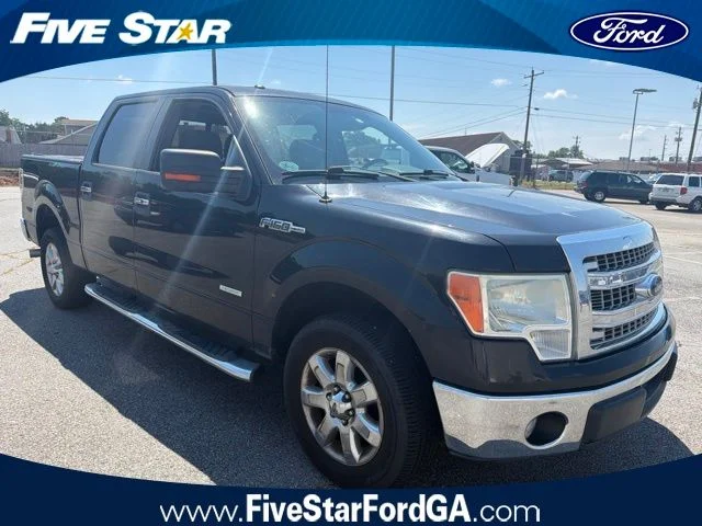 Used 2014 Black Ford XLT image 1