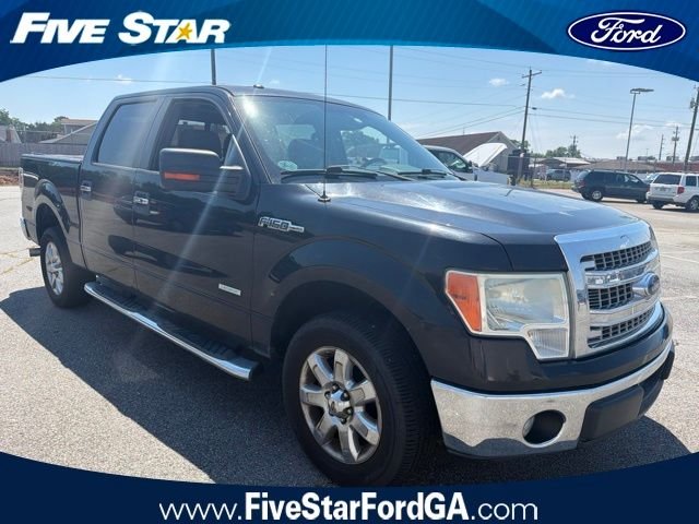 Used 2014 Black Ford XLT image 1