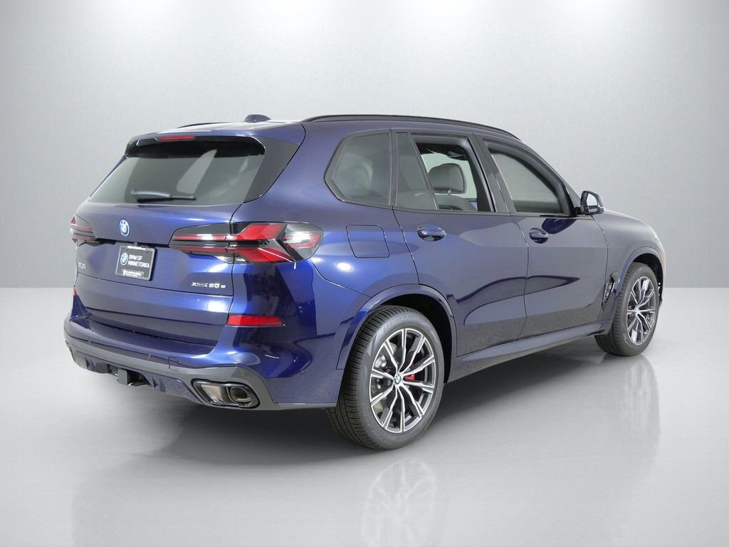 New 2026 Tanzanite Blue II Metallic BMW xDrive50e image 9