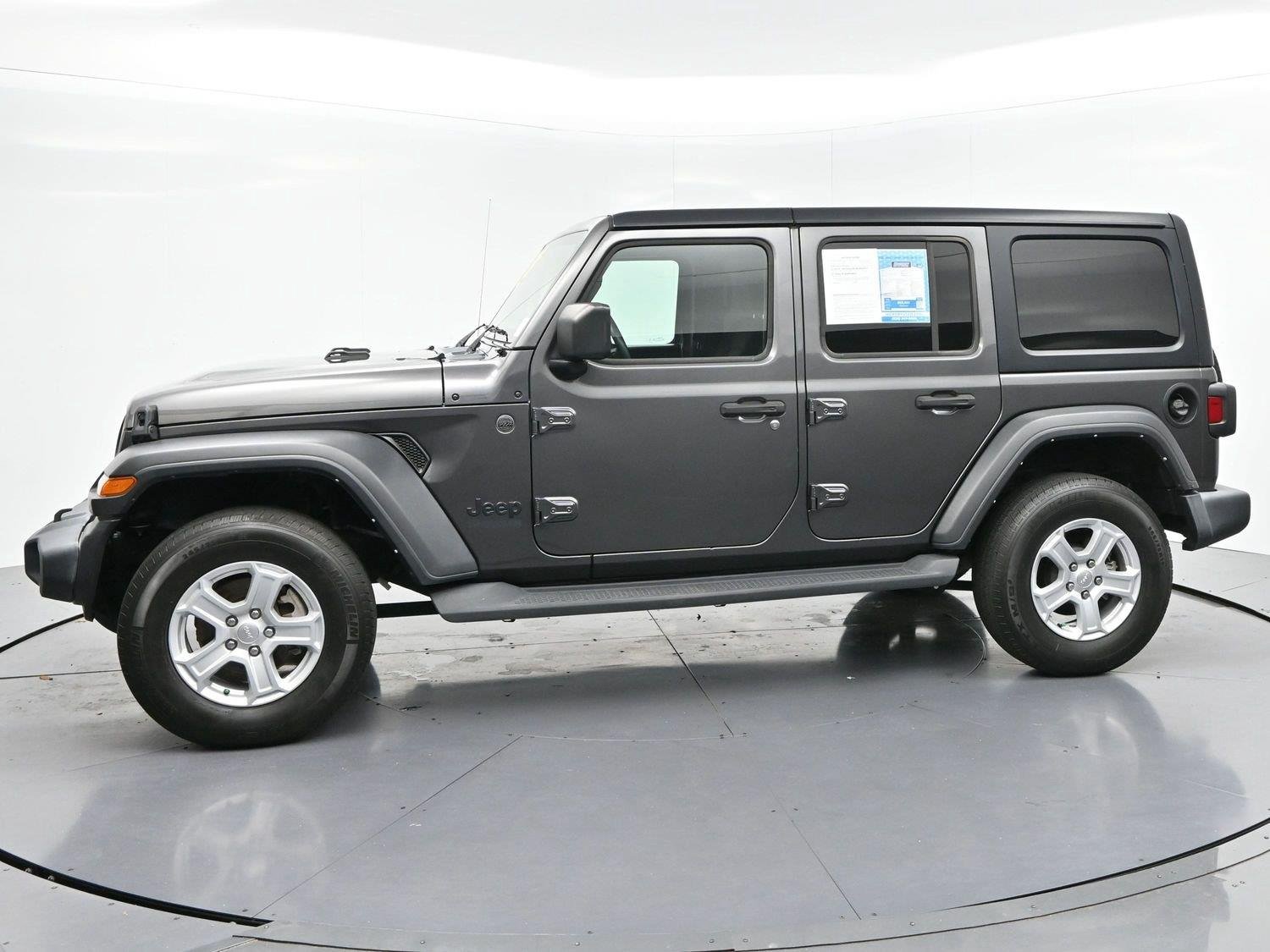 Used 2022 Granite Crystal Metallic Clearcoat Jeep Unlimited Sport S image 4