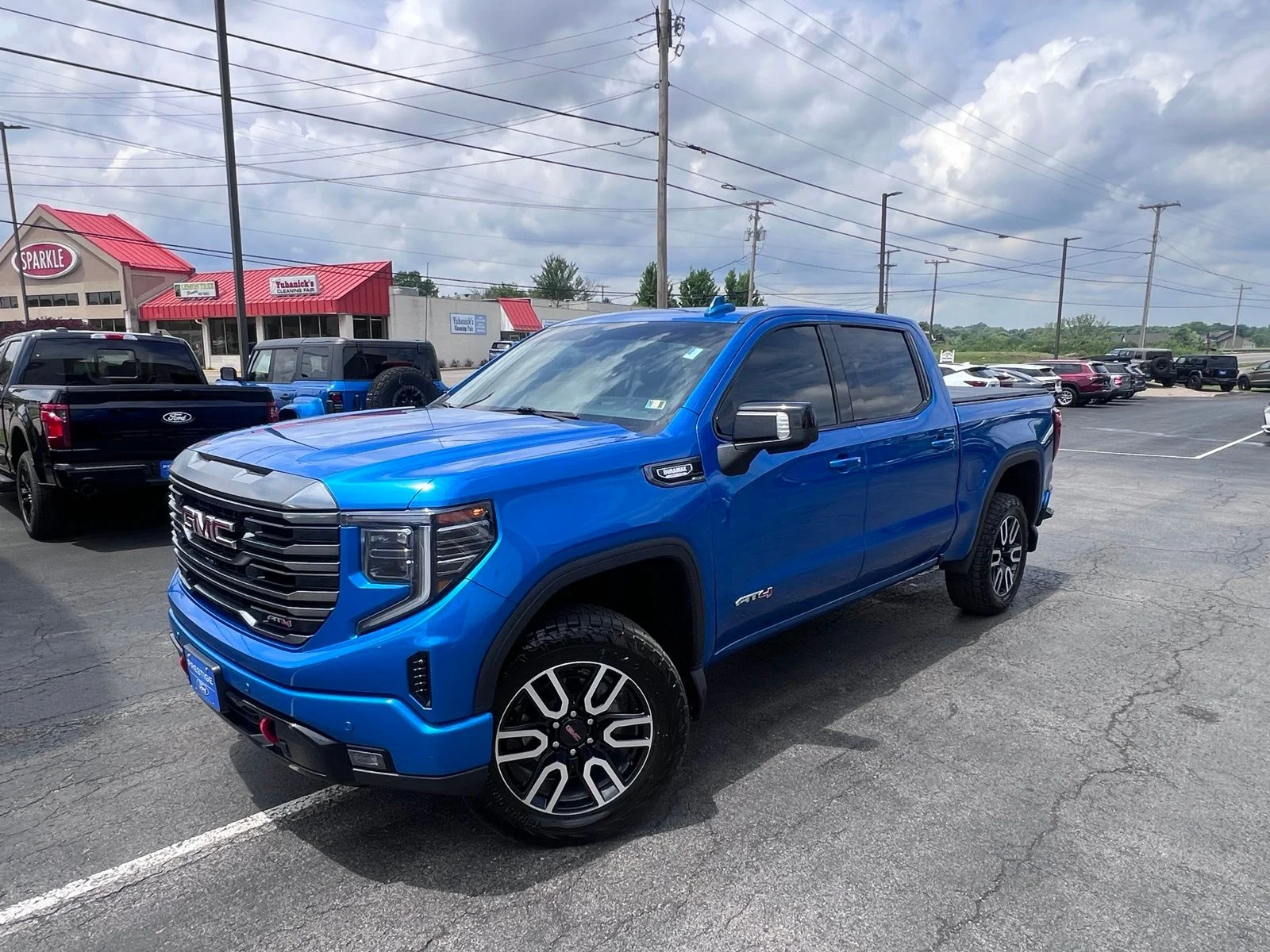 Used 2024 Blue Metallic GMC AT4 image 12