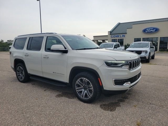 Used 2022 White Pearl Jeep Series III image 22