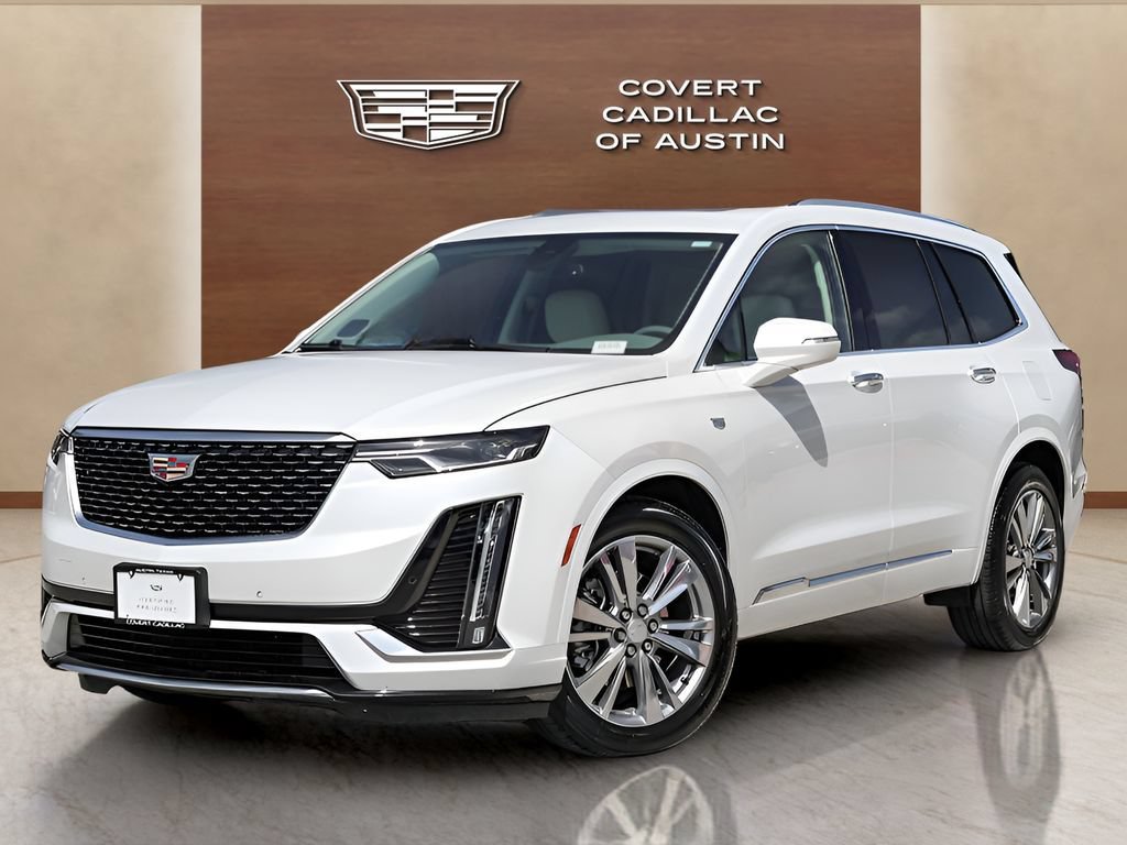 Used 2023 CRYSTAL WHITE TRICOAT Cadillac FWD Premium Luxury image 1