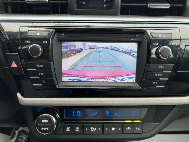 Used 2016 Barcelona Red Metallic Toyota LE image 44