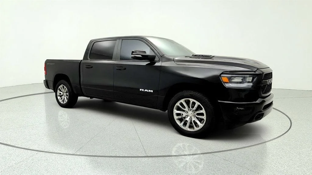Used 2023 Diamond Black Crystal Pearlcoat Ram Laramie 4x4 Crew Cab 5
