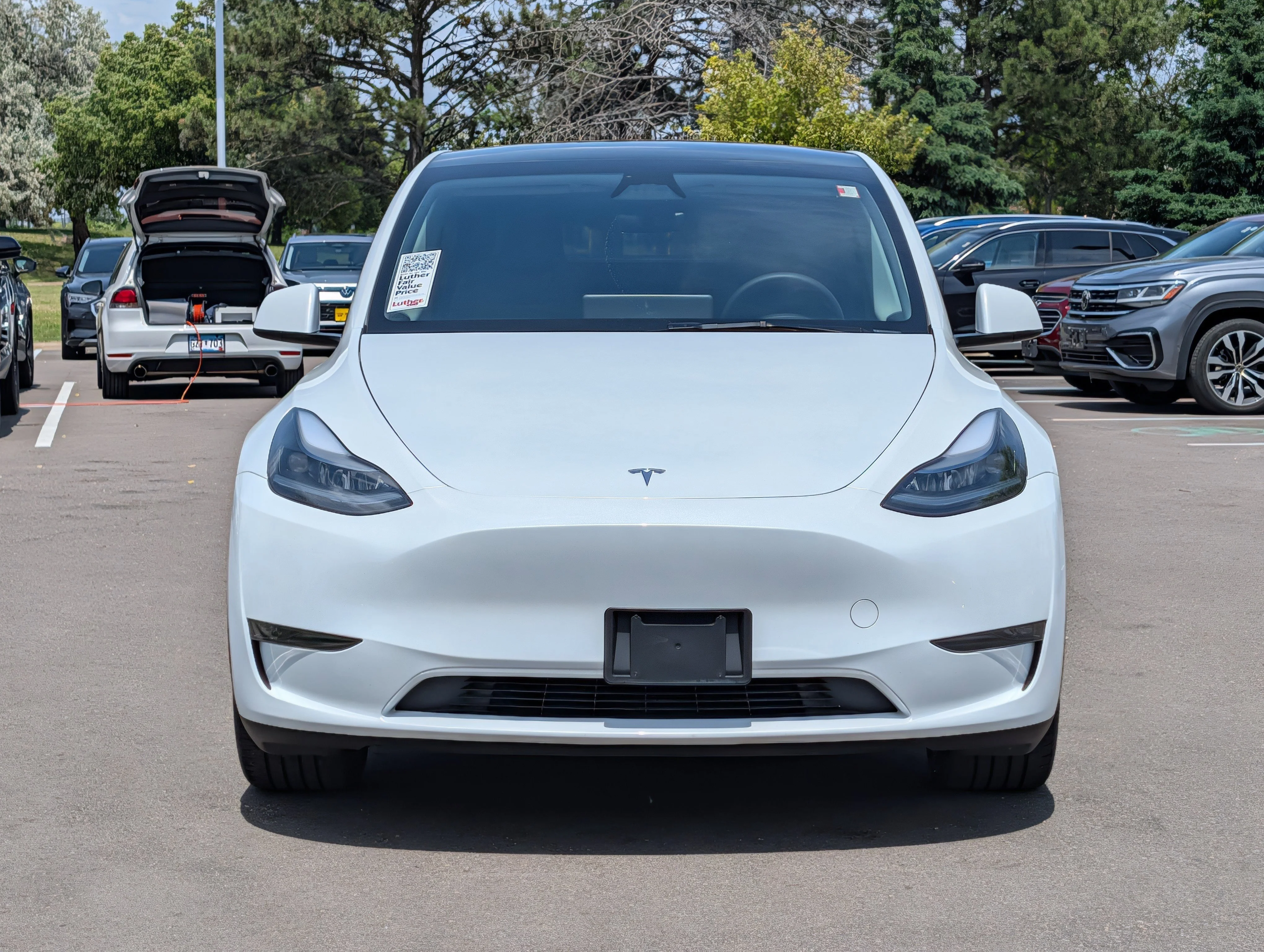 Used 2024 Tesla Model Y Long Range with VIN 7SAYGDEEXRA243310 for sale in Burnsville, MN