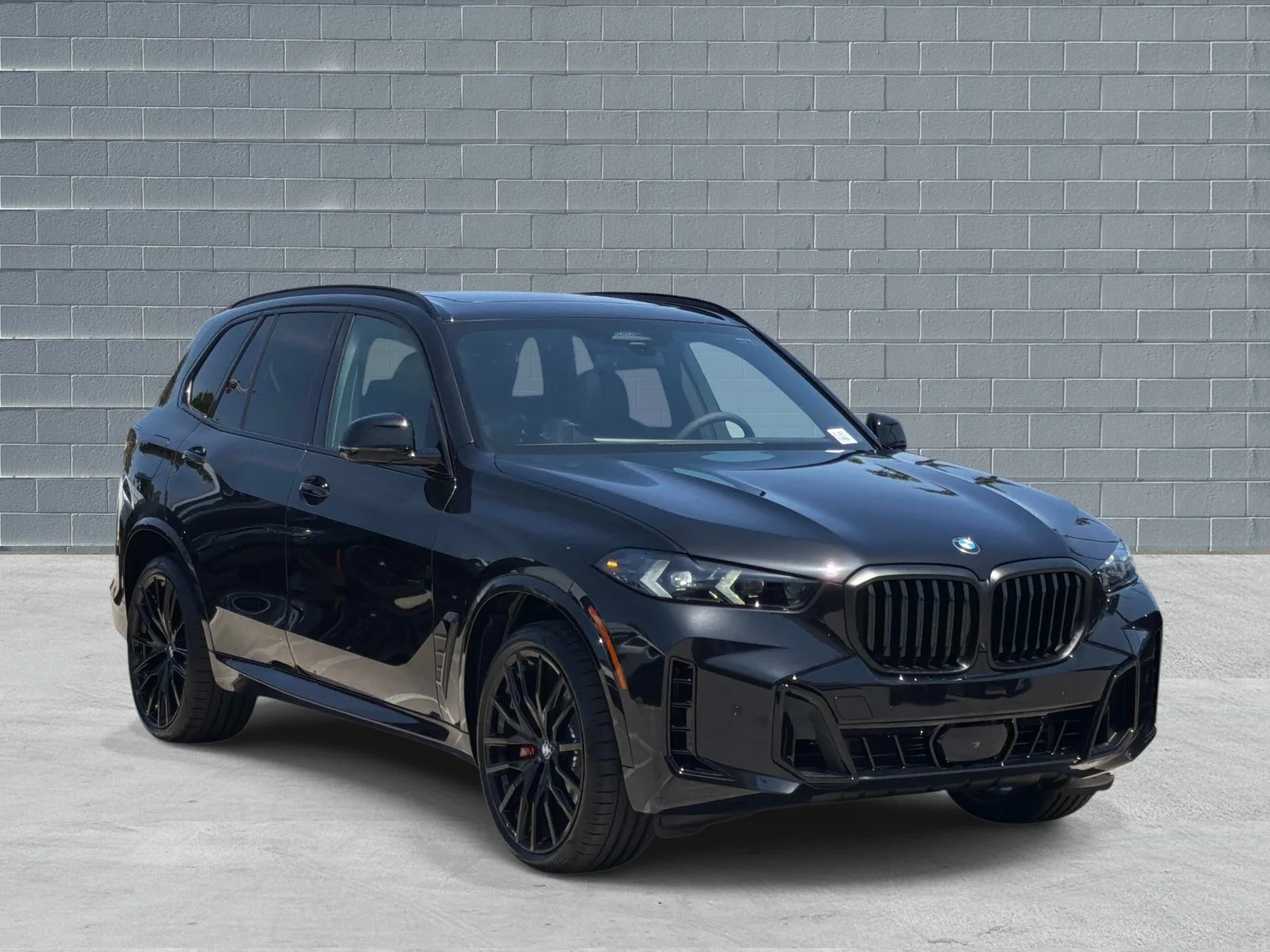 New 2026 Black Sapphire Metallic BMW sDrive40i image 1