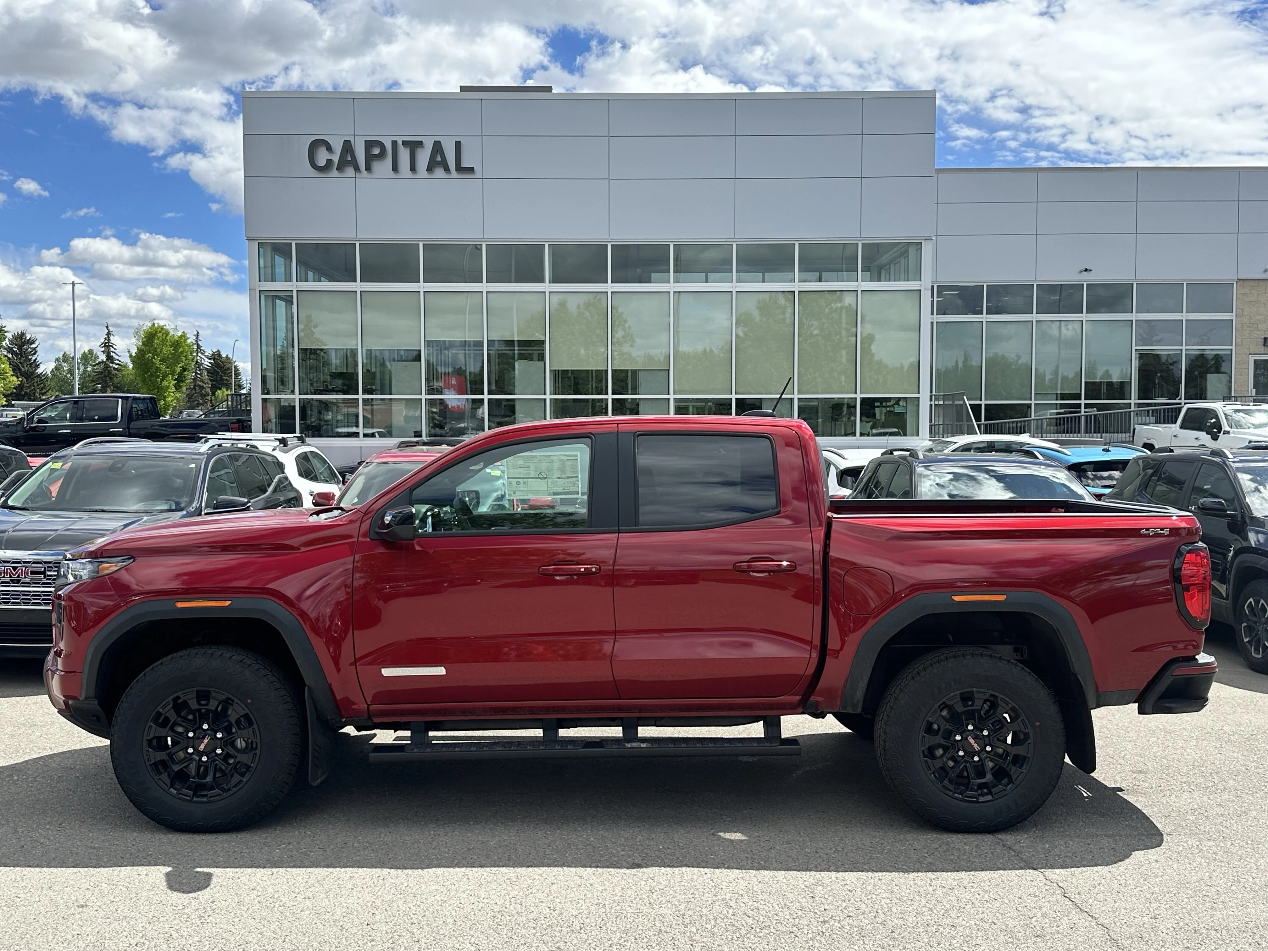 New 2026 Volcanic Red Tintcoat GMC Elevation image 3