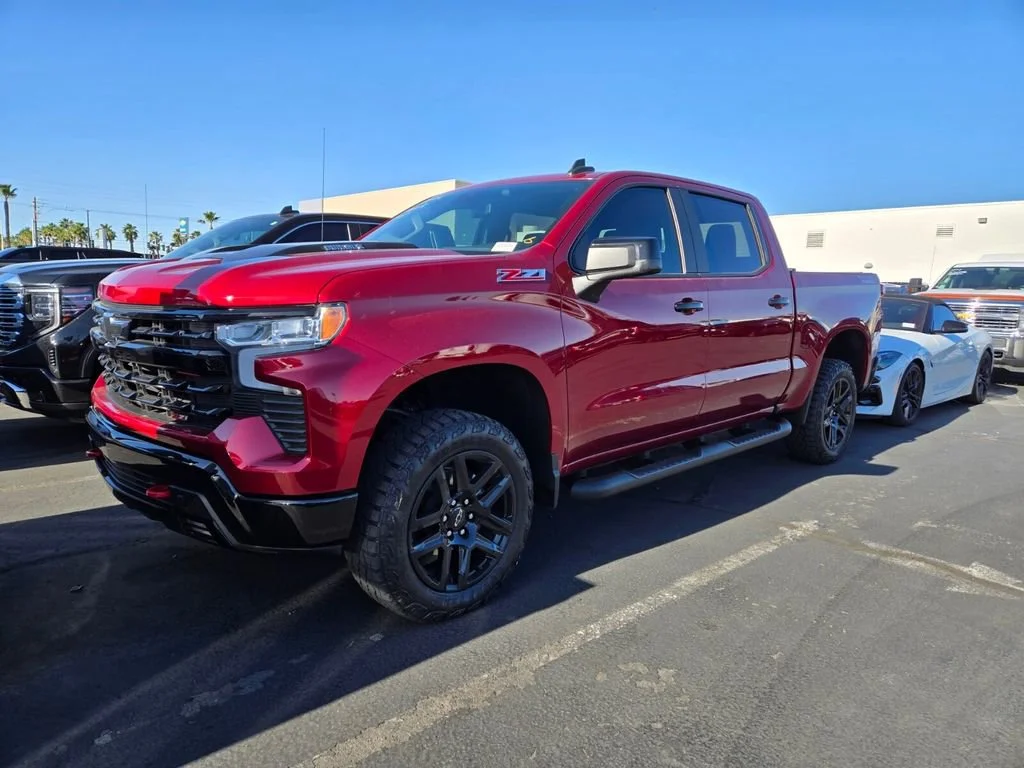 Used 2024 Radiant Red Tintcoat Chevrolet LT Trail Boss image 1