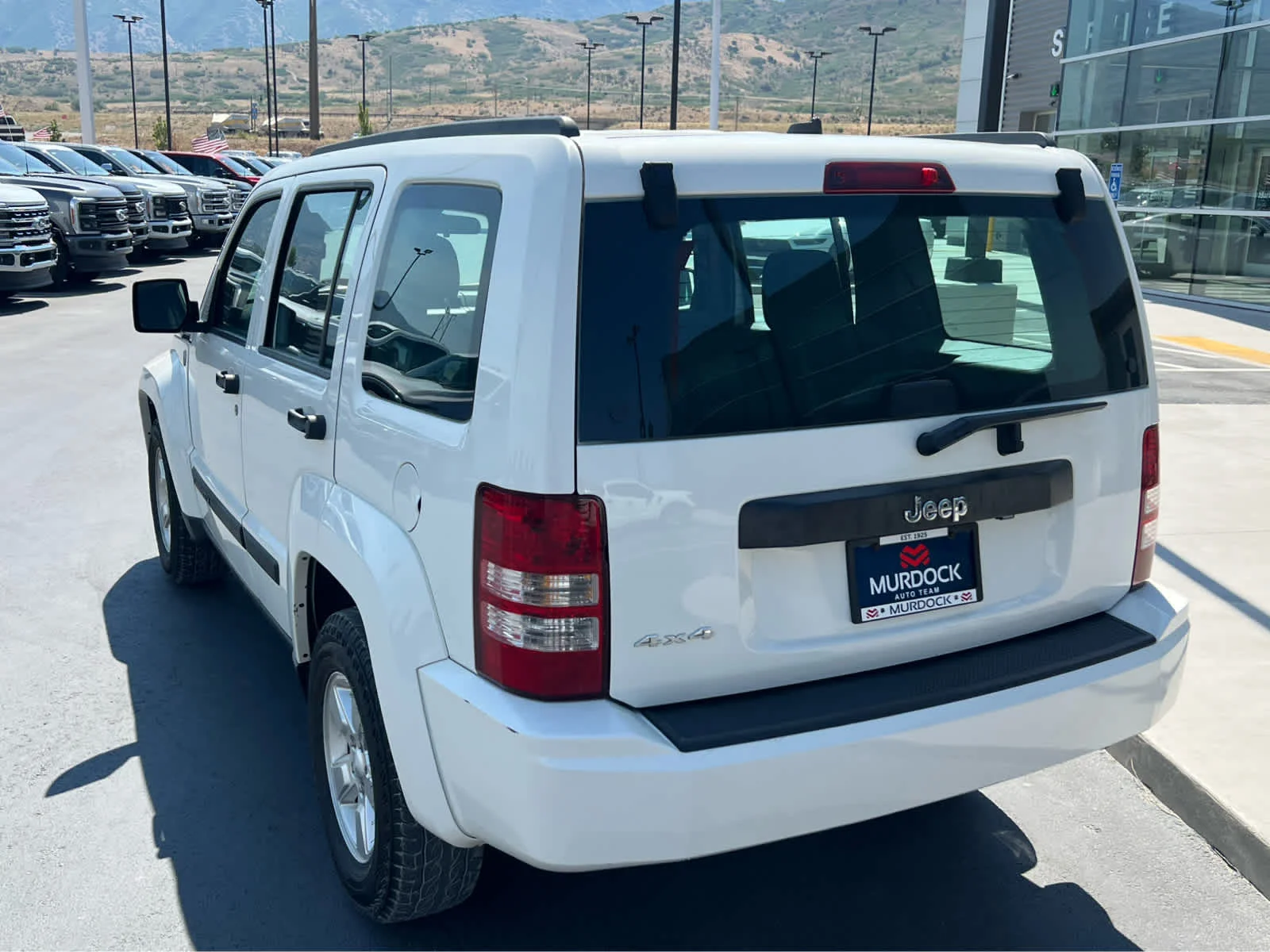 Used 2010 Stone White Clearcoat Jeep Sport image 10