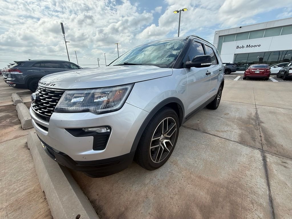 Used 2018 Ingot Silver Ford Sport image 1