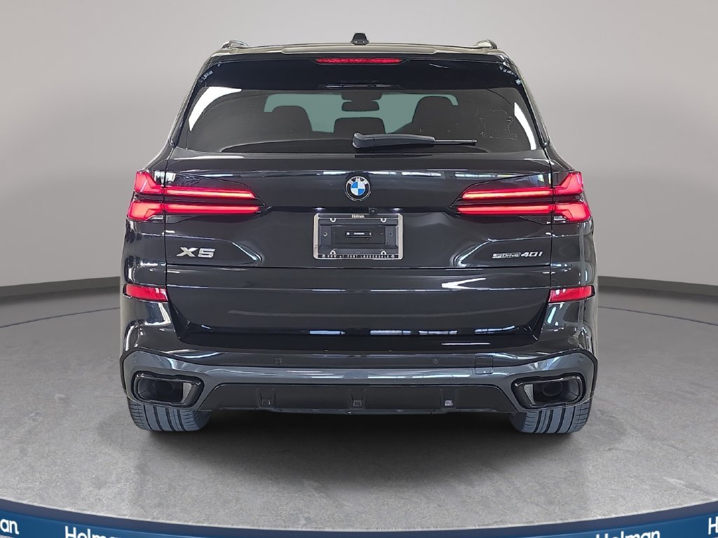 Certified Used 2025 Black Sapphire Metallic BMW sDrive40i image 8