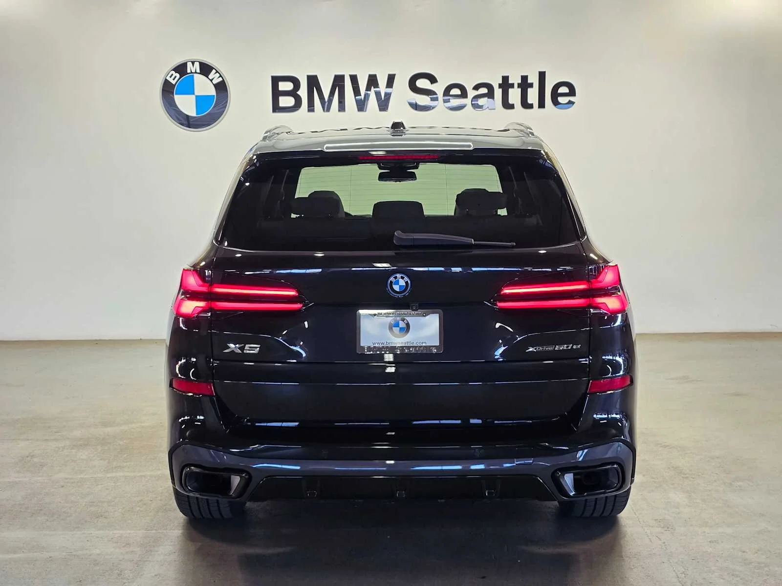Used 2024 Black Sapphire Metallic BMW xDrive50e image 5