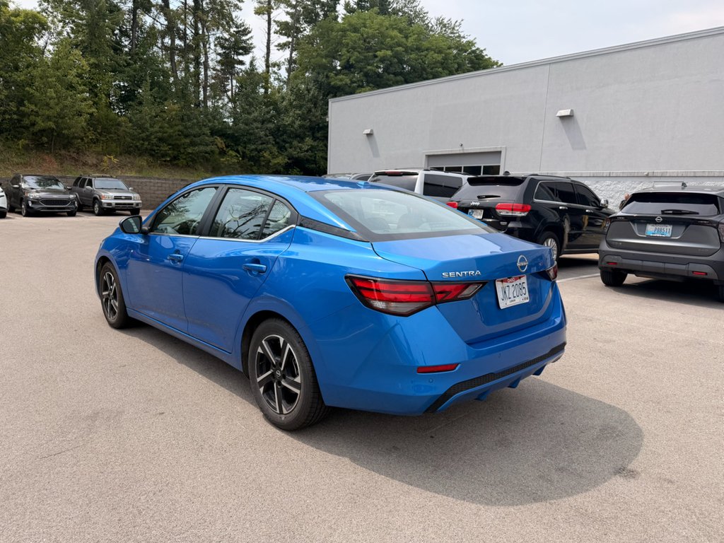 Used 2024 Electric Blue Metallic Nissan SV image 5