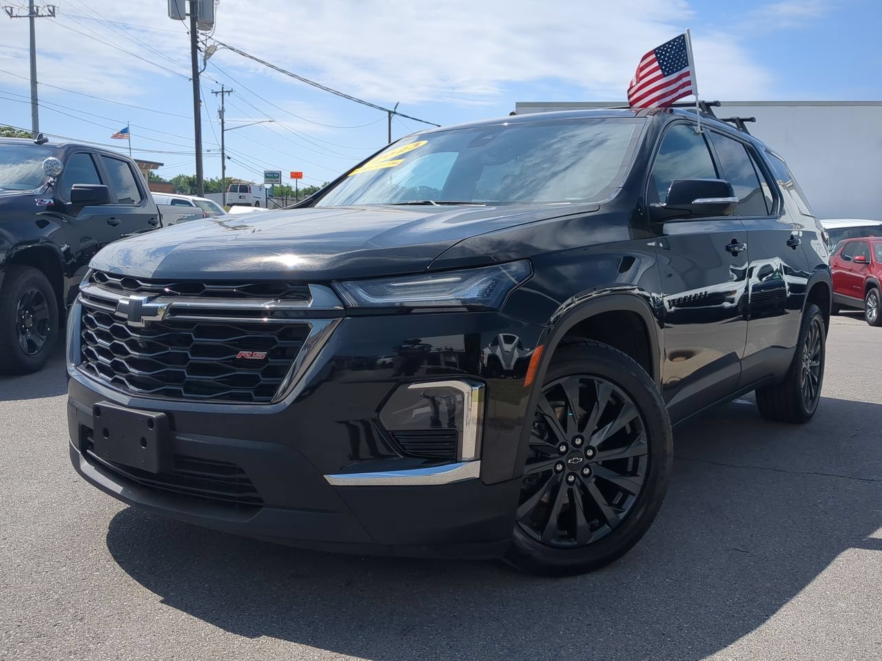 Used 2023 Mosaic Black Metallic Chevrolet RS image 1